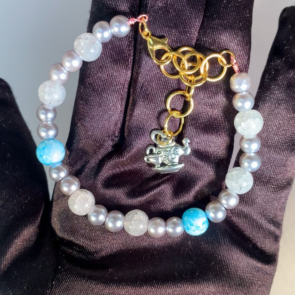 SEEPED THOUGHTS — Handmade Silver & Blue Glass Beaded Bracelet with Teapot Charm